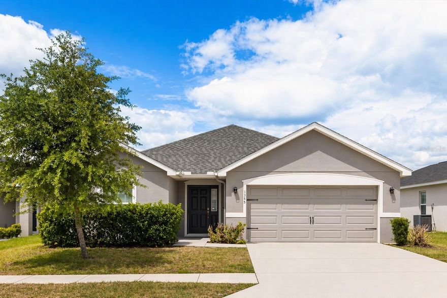 Welcome to 1385 Mezzavalle Way in Auburndale, located in the desirable Enclave at Lake Myrtle community. Built in 2021, this well-maintained single-story home offers approximately 2,004 square feet of living space with 3 Bedrooms, 2 Bathrooms and a versatile Den/Flex room.
The home features an open-concept layout connecting the living, dining, and kitchen areas, providing a functional space for everyday living and entertaining. The kitchen offers ample Cabinetry and Workspace, Custom Pantry and LVP flooring. A split-bedroom floor plan provides added privacy, with the primary suite situated separately from the secondary bedrooms. The additional bedrooms are generously sized, and the flex/den space can be used as an office, guest room, or additional living area. Both bathrooms include modern fixtures consistent with the home’s newer construction. Additional features include block and stucco construction, a shingle roof, slab foundation, and a 2-car attached garage. The property sits on a 5,500+ square foot lot with manageable outdoor space. Conveniently located near major roadways, shopping, dining, and the Lake Myrtle Sports Complex. The community offers low HOA fees and no CDD. This property presents an excellent opportunity for homeowners and investors alike. Whether you’re looking for a primary residence, a newer build with modern features, or an investment in a rapidly developing Central Florida market, this home delivers the perfect combination of space, functionality, and long-term value. Contact me for a private showing!