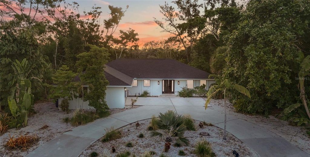 Photo of 635 Tropical Circle, Sarasota, FL 34242 (MLS # A4668594)