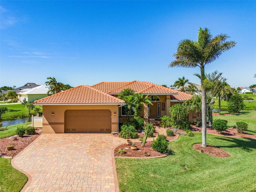 Turnkey Waterfront Retreat in Burnt Store Lakes – Fully Furnished & Ready to Enjoy

Discover your perfect Florida escape in this beautifully appointed, move-in-ready home, ideally situated on an oversized tip lot on a peaceful cul-de-sac. Surrounded by lush landscaping and offering panoramic water views, this fully furnished oasis blends comfort, style, and effortless indoor-outdoor living.

Step through expansive pocket sliders to your private heated pool and brand-new pool cage—ideal for sun-soaked afternoons or starlit gatherings. Inside, the spacious, light-filled layout features a luxurious primary suite with tranquil water views, direct pool access, and a bathroom complete with a zero-entry shower, double vanity with ample storage, and a private water closet.

The open-concept living area flows seamlessly into a modern kitchen and dining space, framed by impact-rated windows and sliding doors for enhanced safety and energy efficiency. Two guest bedrooms feature walk-in closets, with one providing direct access to the pool.

Additional highlights include a new roof, full impact protection, and tasteful furnishings throughout—making this home truly turnkey. Residents of Burnt Store Lakes enjoy access to a kayak launch leading to Charlotte Harbor, plus a scenic park with a playground, fishing dock, and pavilion. Just next door, Burnt Store Marina offers a 27-hole executive golf course, two waterfront restaurants, and the largest deep-water marina in Southwest Florida.

Whether you're seeking a year-round residence or a seasonal getaway, this rare waterfront gem delivers the ultimate Florida lifestyle.