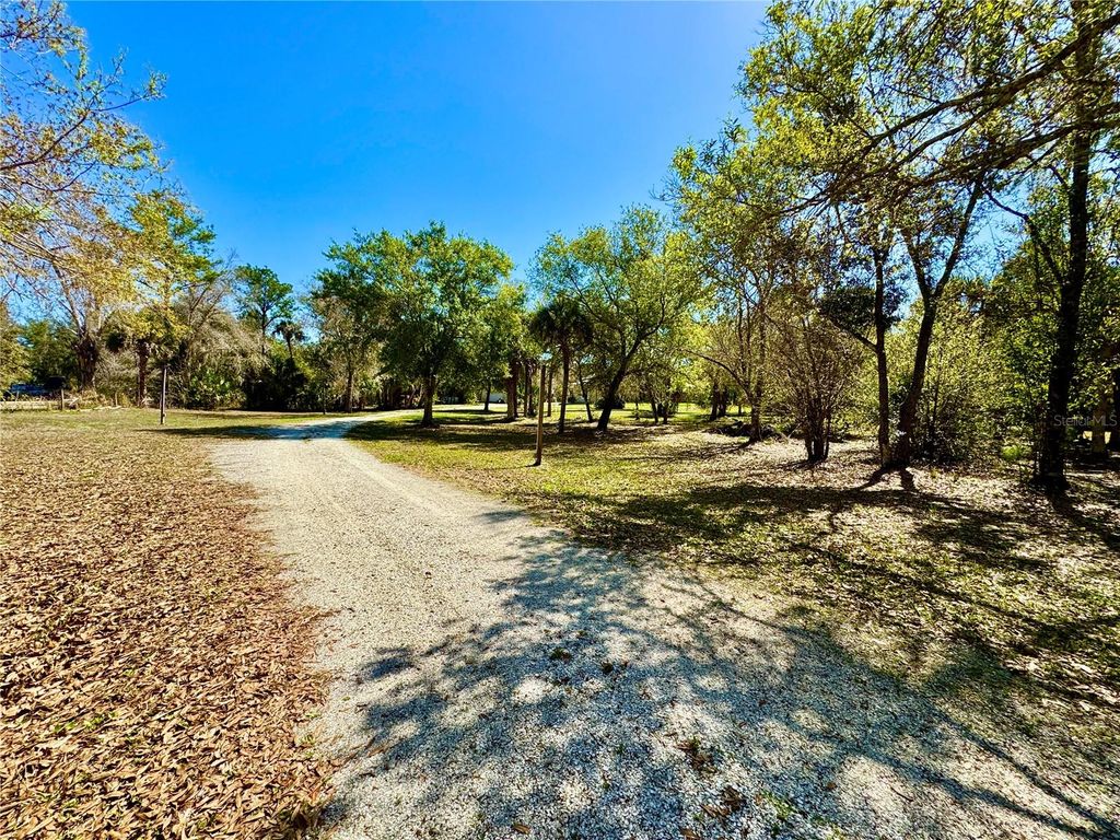 Photo of 6594 Buckboard Street, North Port, FL 34291 (MLS # N6143372)