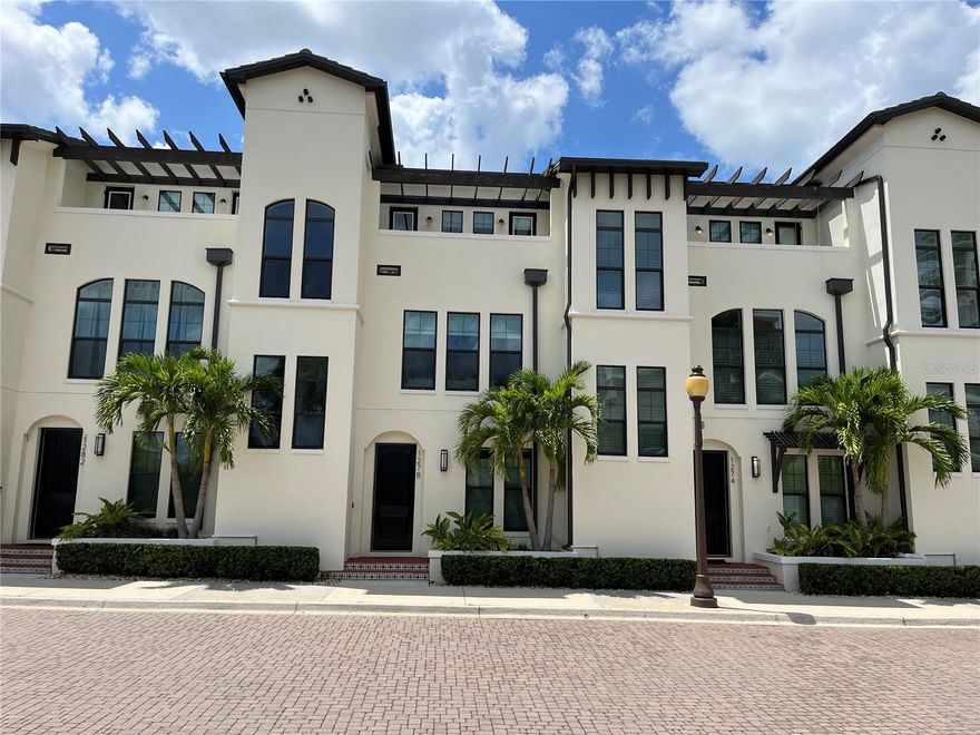 Rarely available ANNUAL FURNISHED RENTAL TOWNHOUSE in the heart of SARASOTA DOWNTOWN! This charming residence features almost 2,300 sq ft and a unique layout, including 3 bedrooms, 3.5 bathrooms, a formal dining area, and a two-car garage with updated epoxy flooring. Inside, comfort meets elegance with tall ceilings, arch elements, wide accent moldings and baseboards, granite countertops, and high-quality hardwood flooring throughout the house, with no carpet hassle. The spacious living room flows into the kitchen and dining area, creating a large, open space on the second floor. The powder room is also located on the second floor to enhance the comfort of living. At the center of the home is a generously sized kitchen, complete with a pantry, a kitchen island with a high-bar seating area, and stainless-steel appliances in like-new condition. The primary suite is located on the top floor and has an entrance to the private patio, offering beautiful city views. The primary bathroom is a true retreat, featuring a spacious walk-in closet, dual sinks, a shower, and a separate toilet room. The second suite has an enclosed full bathroom and conveniently located on the first floor. The third bedroom, which currently serves as a home office, is located on the same level as the master suite. A nicely sized laundry closet has a full-size washer and dryer. A superb LOCATION in Sarasota Downtown: about 10 minutes driving to Lido Beach, about 15 minutes driving to famous Siesta Key Beach. Van Wezel Performing Art Hall, Bayfront Park, Main Street and plenty of shopping, entertainment, and dining options within a 5-10 minutes driving and even walkable distance. This luxuriously furnished townhouse is designed with convenience and comfort in mind, making it the perfect place for you to start your next chapter.