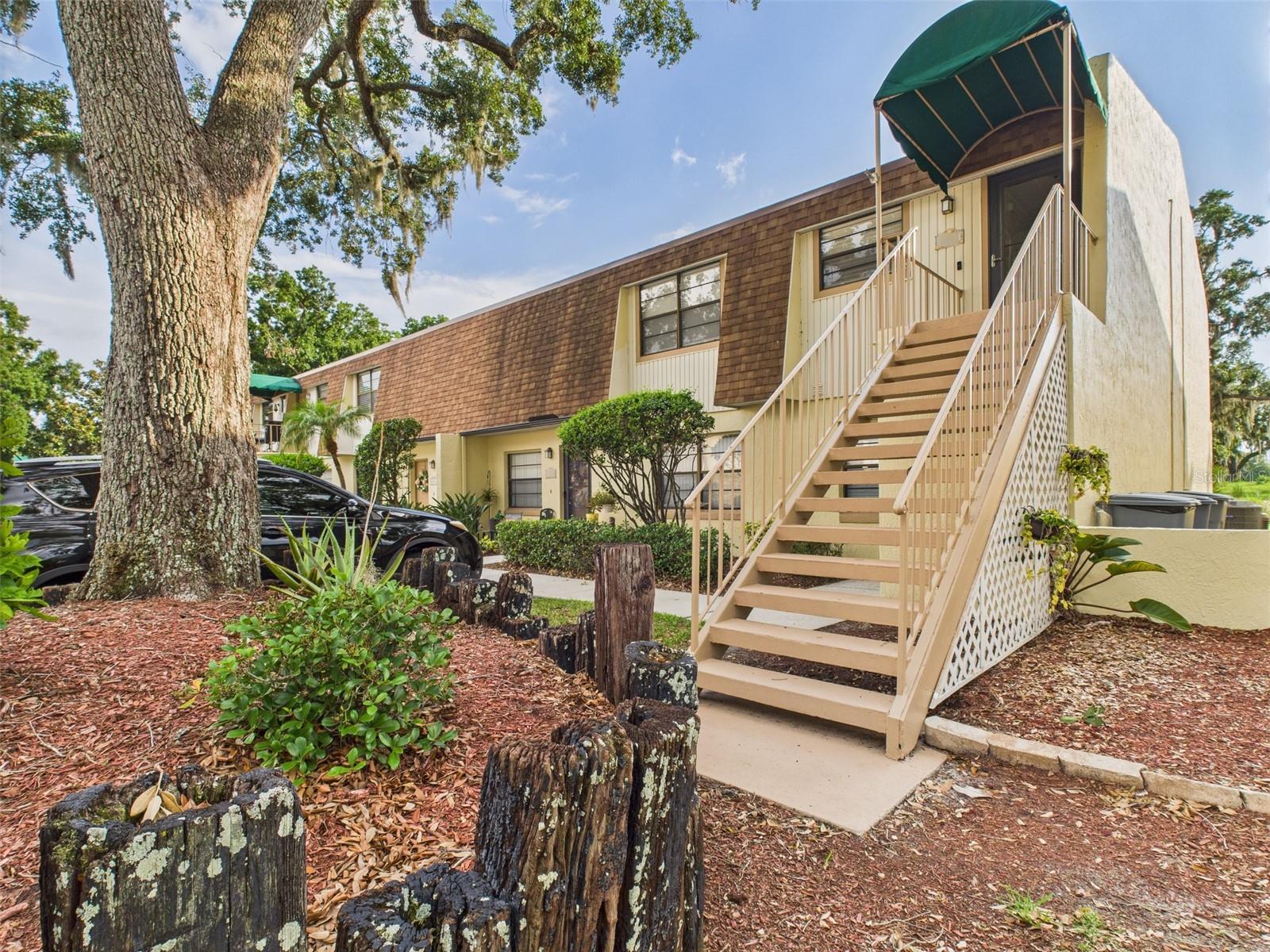 MUST SEE! Welcome to this charming 2BR 2BA property in Mulberry, Florida. This beautiful 2nd floor condo has a very welcoming floor plan, modern light fixtures, and hardware throughout, several large windows that stream in natural light, indoor laundry in-unit, new flooring...you name it! The water heater and all appliances were replaced in 2022, and the AC unit was replaced in 2018. This unit is located away from any busy roads, down near the community POOL & spa and features reserved parking space large enough for 2 vehicles. Located within the Fairwoods Imperial Gates community, the relatively low HOA fee covers cable, the community pool and spa, landscaping, and exterior maintenance, including building repainting and roof upkeep, as well as trash collection and more. Seller financing and private financing available! Do NOT wait, it will not last long!