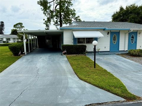 Photo of 7 Desert Candle Circle, Lehigh Acres, FL 33936 (MLS # A4670959)