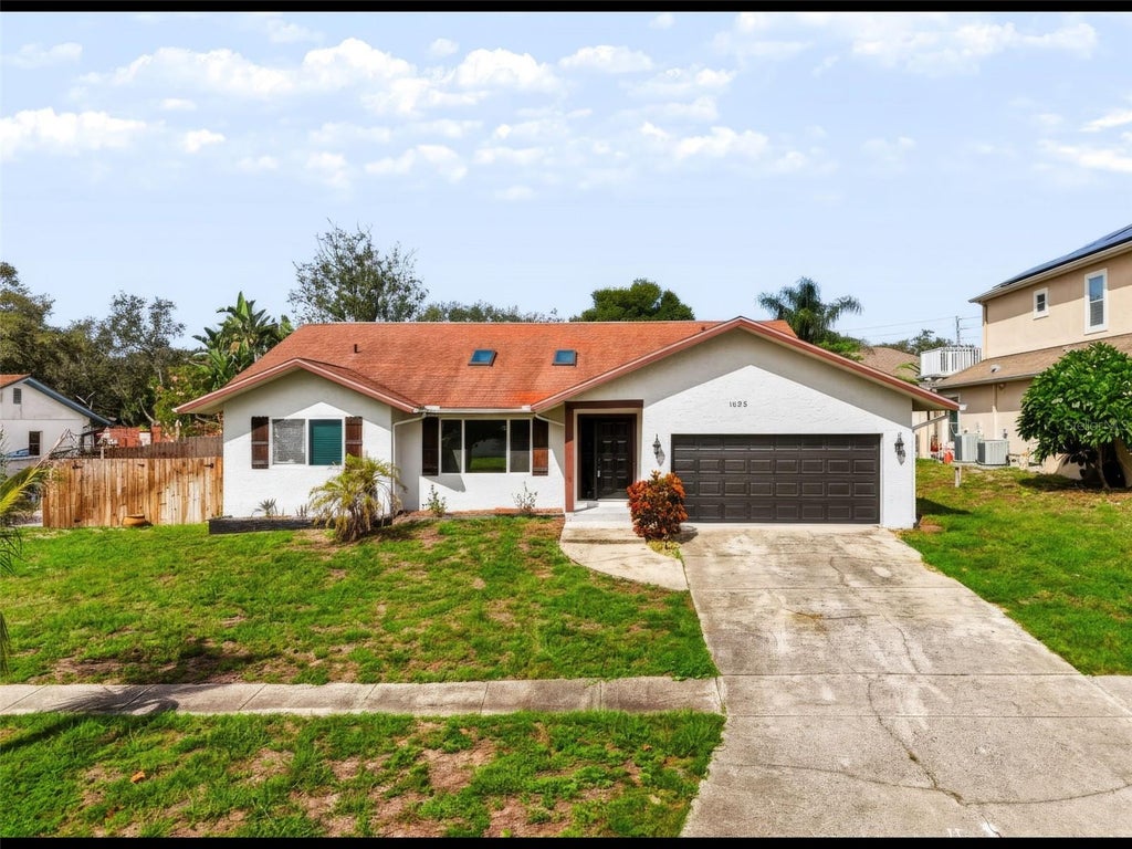 Photo of 1035 Anclote Drive, Tarpon Springs, FL 34689 (MLS # TB8539413)