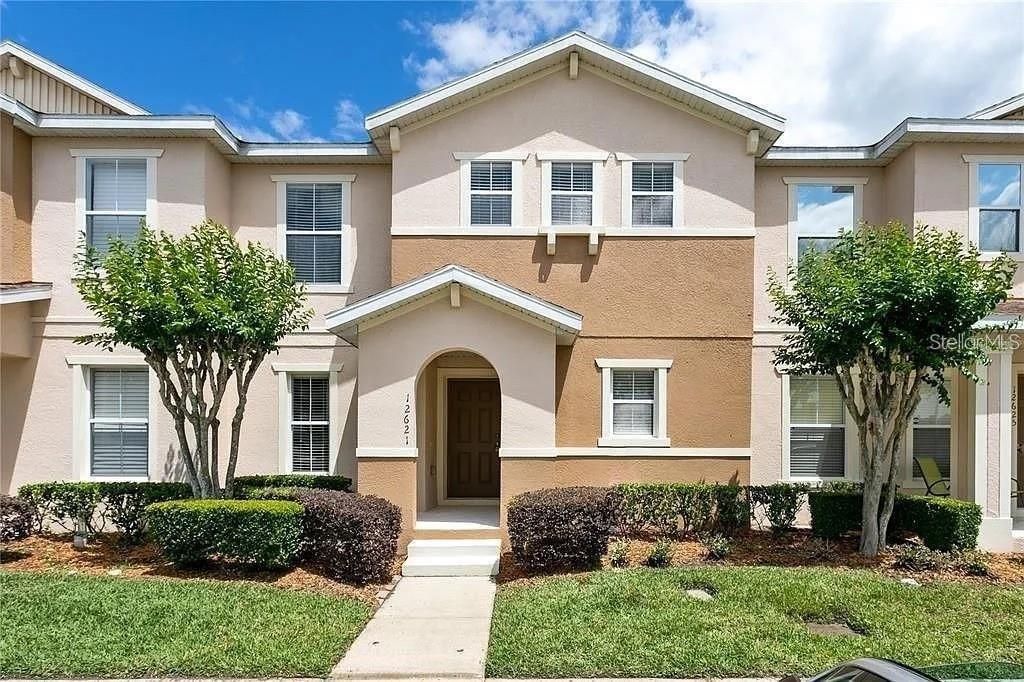 Photo of 12621 Tanja King Boulevard, Orlando, FL 32828 (MLS # O6401938)