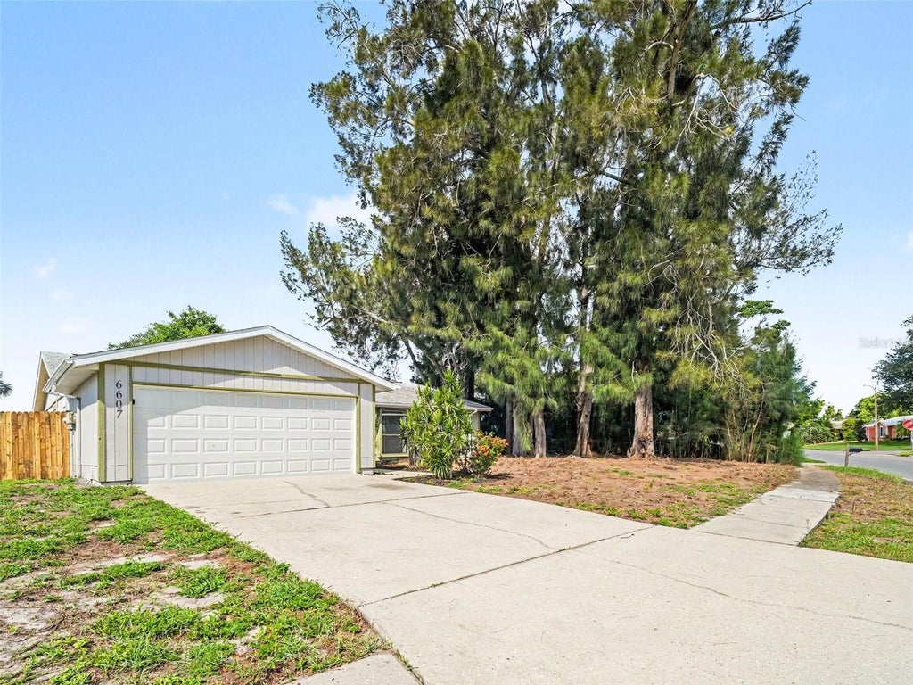 Photo of 6607 36th Avenue Drive W, Bradenton, FL 34209 (MLS # O6441016)
