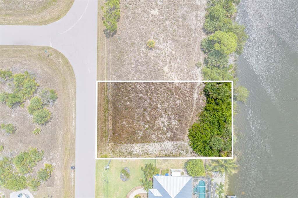 Photo of 15424 Hennipen Circle, Port Charlotte, FL 33981 (MLS # C7526030)