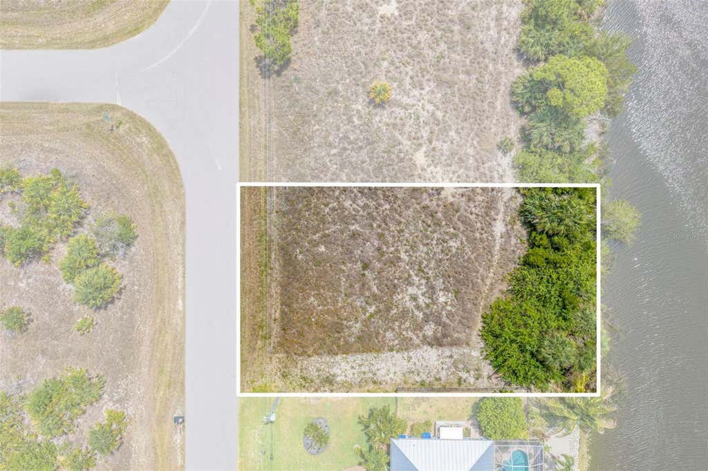 Photo of 15424 Hennipen Circle, Port Charlotte, FL 33981 (MLS # C7526030)