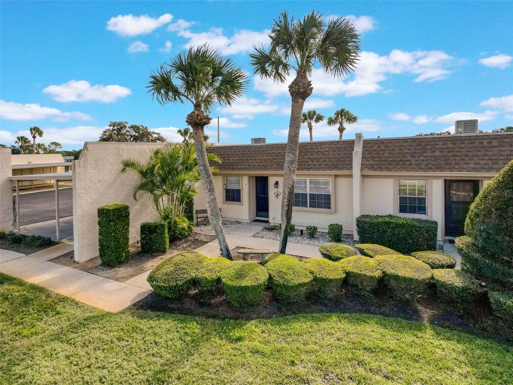 Photo of 11110 Carriage Hill Dr #1, Port Richey, FL 34668 (MLS # W7880706)