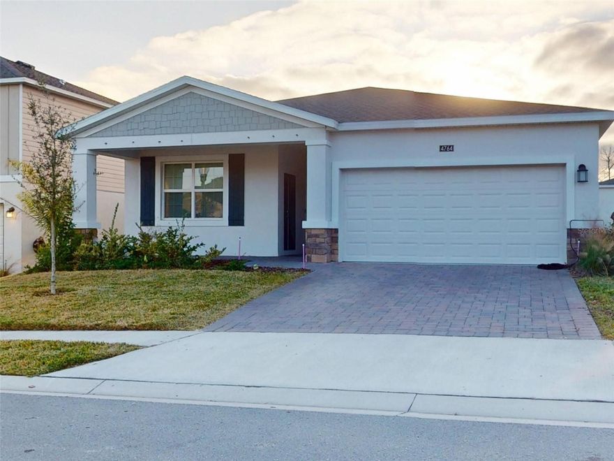 Beautiful 2025 new construction single-family home located in the highly sought-after Providence Golf & Country Club community in Davenport, home to the Majestic Championship Golf Course. The property was previously occupied by the owners and is well maintained. This 3-bedroom, 2-bath residence with a spacious den and 2-car garage offers modern design, open living spaces, and a comfortable layout ideal for everyday living.

The attached Next Gen studio is currently occupied and not included in the rental; the main home is available for lease. The main residence features an open-concept living and dining area filled with natural light, a functional modern kitchen with ample cabinet and counter space, and a flexible den perfect for a home office, media room, or additional living area.

The spacious primary suite offers a private en-suite bathroom and two walk-in closets, while secondary bedrooms are well sized and positioned in a split floor plan for added privacy. Additional features include energy-efficient construction, generous interior storage, and a 2-car garage.

Enjoy a spacious, unfenced backyard with beautiful sunset views, providing a peaceful outdoor setting and open feel. Residents of Providence enjoy resort-style amenities, including the Majestic championship golf course, clubhouse with restaurant and pro shop, resort-style pool, fitness center, tennis courts, walking trails, and expansive green spaces throughout the gated community.

Conveniently located near major highways, shopping, dining, and schools, this home is approximately 20 miles from Universal Studios and other major Orlando attractions, offering an excellent combination of space, lifestyle, and modern construction in one of Central Florida’s most desirable golf communities.