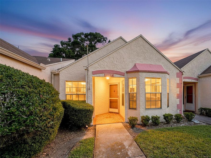 Welcome home to this beautifully maintained 2-bedroom, 2-bath, 1-car garage condo in the sought-after 55+ community of Timber Oaks! As you step inside, you’re greeted by a freshly painted interior and tile plank flooring in the living area and vinyl plant in both bedrooms, providing a clean, modern feel. The well-lit eat-in kitchen features real oak cabinets, granite countertops, a bay window, closet pantry, and convenient pull-out drawers plus a lazy Susan beneath the sink.

The primary bedroom offers a walk-in closet, full bath, and sliding doors leading to the enclosed sun porch, a perfect place to relax with your morning coffee. The second bedroom features a charming bay window that adds natural light and character. Step out your back door and you’re just a few steps from the Village pool, the perfect spot to unwind and enjoy the Florida sunshine.

Timber Oaks offers a vibrant lifestyle with amenities including a heated lakefront pool and spa, fitness center, card and billiard rooms, library, and courts for tennis, shuffleboard, and bocce. The HOA fee covers exterior maintenance (including roof), lawn care, pest control, trash, and basic cable. Conveniently located near shopping, dining, and Gulf beaches—just move in and start living your best Florida life!