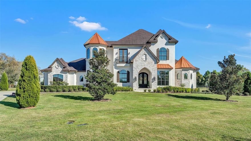 Welcome to 5676 Case Ln, an impressive and stunning masterpiece nestled within the exclusive gated community of Case Reserve in South Lakeland. This custom-built European-style estate, crafted by renowned builder Duane McQuillen, offers a unique blend of opulence, sophistication, and entertainment. Set on a sprawling 1.61 acres at the end of a quiet cul-de-sac, the property exudes the grandeur of a private castle, featuring custom iron cast doors and exquisite stained woodwork throughout the entire home. Inside, this 5-bedroom, 5-bathroom home is designed with every detail in mind. The primary suite, located on the first floor, offers the most serene views of the lush surroundings. Complete with dual walk-in closets and a stand-alone copper tub, the en-suite bath is a true sanctuary, while the tray ceiling adds an extra touch of elegance. The living room features a stunning gas fireplace and extra-large sliding doors that pocket seamlessly behind the wall, allowing the space to open completely to the outdoors. The gourmet kitchen is a chef's dream, with Viking stainless steel appliances, custom Amish antique cabinets, a walk-in pantry, and stone countertops that beautifully complement the home's luxurious design. Upstairs, discover two spacious bedrooms and bathrooms, as well as an upstairs loft perfect for relaxation or play. For those who desire a bit of adventure, the fire pole provides a quick and fun way to travel from the second floor to the first. The home's combination media room and game room ensures entertainment is always at your fingertips, while the gym room with full-wall mirrors provides the ultimate space for fitness enthusiasts. The expansive outdoor area is equally as impressive. The custom-built outdoor kitchen, complete with a fire pit, is ideal for entertaining guests, and a brand-new pergola adds elegance to the space. A basketball court, volleyball court, and pickleball court offer endless recreational options, while the infinity-edge pool and jacuzzi provide a private oasis for relaxation. This home is also equipped with cutting-edge technology, including an entire home automation system controlled by Brilliant, allowing you to adjust fans, lights, Sonos, and the intercom system with ease. Solar panels, a 29-kilowatt system, and an 82-kilowatt battery backup (available for additional purchase) ensure the home is as energy-efficient as it is luxurious. The home also features window tinting, ensuring privacy and comfort year-round. A true masterpiece, 5676 Case Ln offers an unmatched combination of luxury, functionality, and style, making it one of the most extraordinary properties in Lakeland.