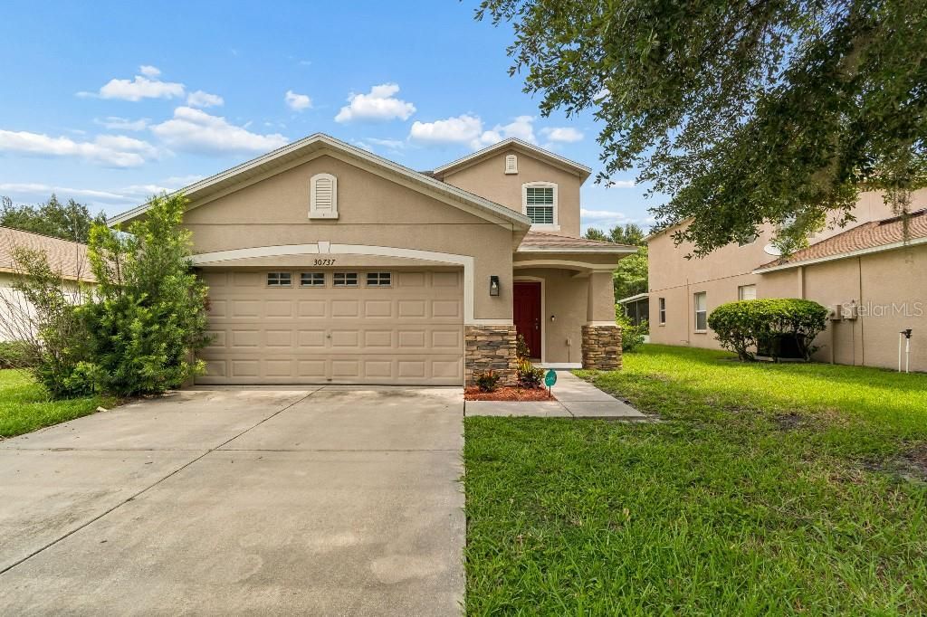 Photo of 30737 White Bird Avenue, Wesley Chapel, FL 33543 (MLS # TB8527521)
