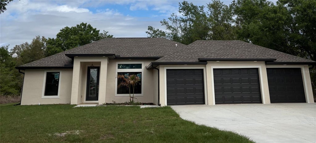 Photo of 7227 Pinedale Drive, Port Charlotte, FL 33981 (MLS # D6148740)