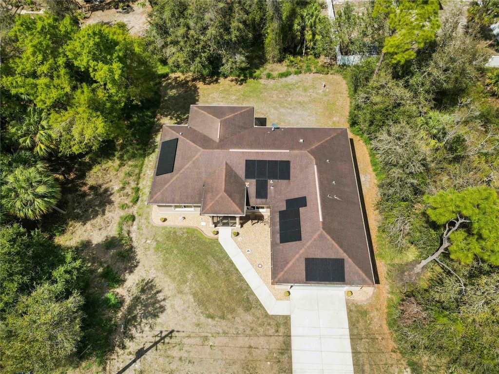 Photo of 3133 S San Mateo Drive, North Port, FL 34288 (MLS # C7523212)