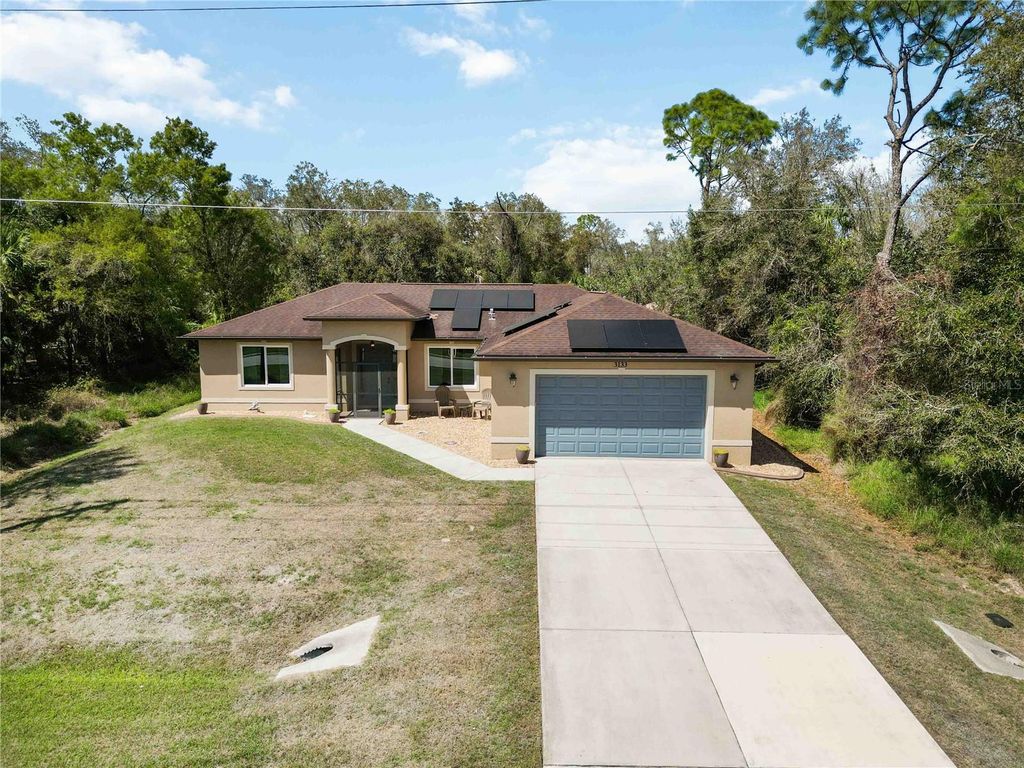 Photo of 3133 S San Mateo Drive, North Port, FL 34288 (MLS # C7523212)