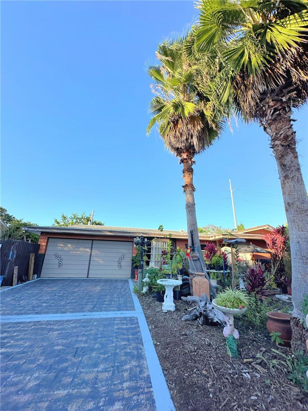 Photo of 1574 Souvenir Drive, Clearwater, FL 33755 (MLS # TB8439573)