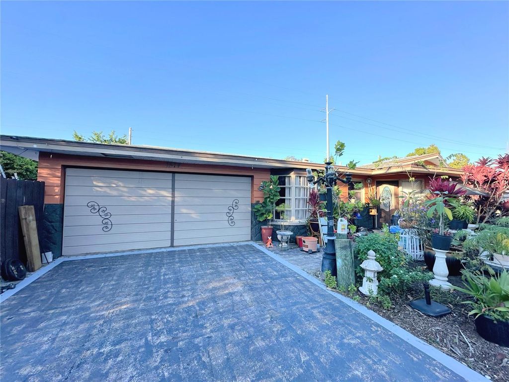 Photo of 1574 Souvenir Drive, Clearwater, FL 33755 (MLS # TB8439573)