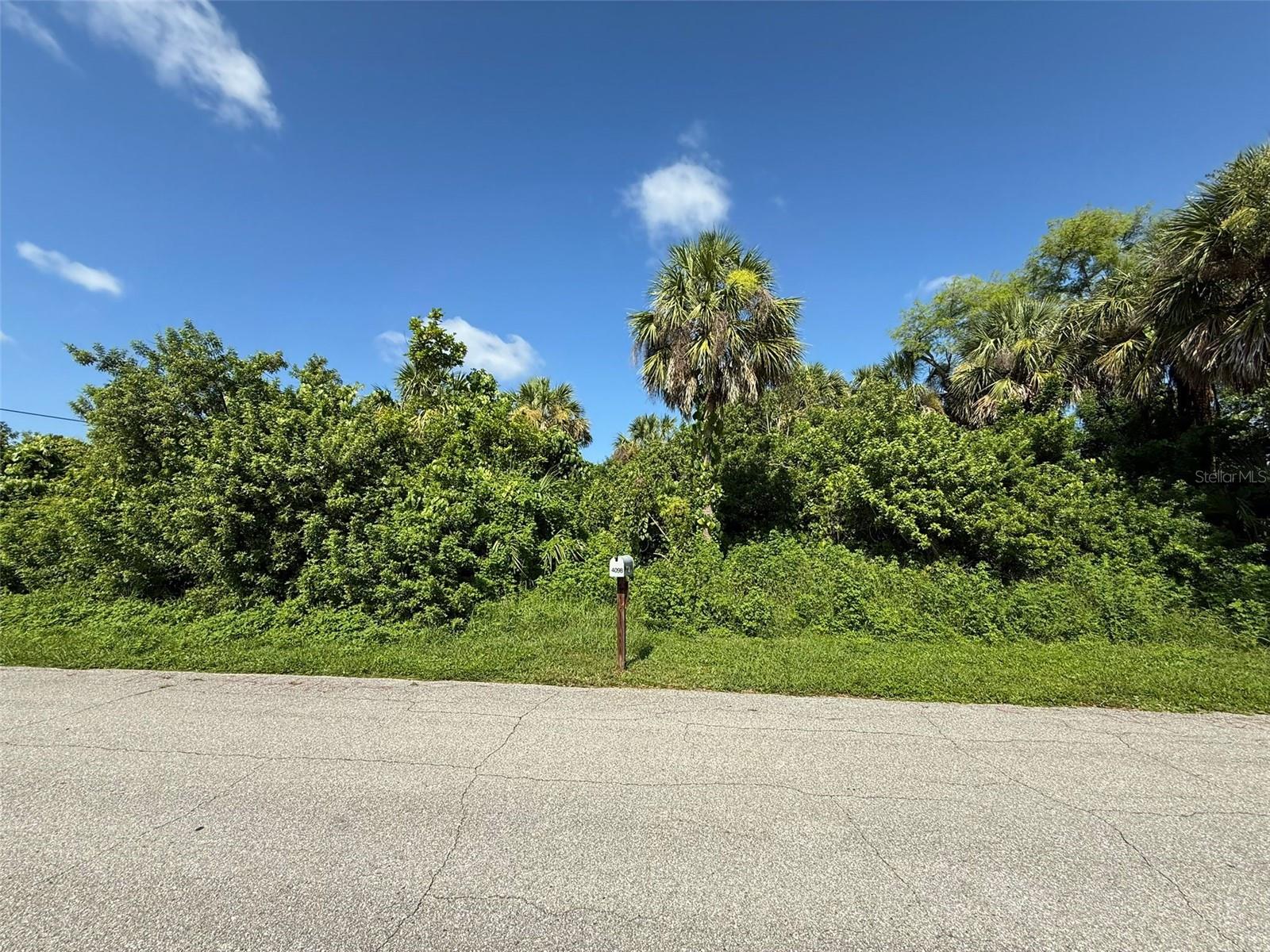 Located Just Minutes from the beach and a lake 500 yards away. Build your dream oasis in the peaceful neighborhood. No HOA fees. This residential lot offers public water, underground power at the street, and will require a septic system until county sewer connections are completed with the Ackerman-Countryman Sewer Project. Conveniently located near excellent schools (Meadow Park, Murdock, PCHS), shopping, dining, and the Port Charlotte Beach Complex (~6 miles). Easy access to I-75, parks, and Gulf beaches. this property is ideal for your custom home or investment portfolio.