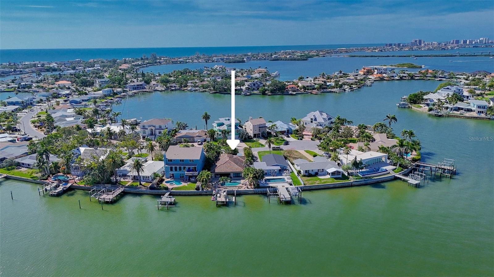 Welcome to an amazing opportunity on the southern tip of Harbor Drive. A slice of waterfront paradise facing southeast on the Boca Ciega. This block-constructed beauty was built in 2015 to sustain CAT 5 hurricanes, and it held strong, only experiencing some interior water damage, making it primed and ready for a full transformation. The bonus FEMA’s Substantial Damage Allowance opens the door to rebuild as-is or go vertical to elevate the dream. The saltwater pool and spa are dazzling with propane heat, surrounded by lush tropical landscaping. Enjoy a sunrise coffee, a midday float followed by an evening dinner waterside. The location is quiet, private and tucked way back at end of a cul-de-sac with no HOA, no rental restrictions and all the short-term potential your portfolio craves. All this comes with the charm and character of Indian Rocks Beach (IRB), where the old-school Florida beach-town vibe exists and thrives. IRB is home to beloved local restaurants serving up freshly caught, just off the boat seafood, a public boat ramp, tennis courts, playgrounds, and of course, white sandy beaches that stretch for miles and miles. There is even a community garden, dog park and endless fun on and off the water, from paddle boarding to pub hopping. This isn’t just a home, it’s a launchpad for a lifestyle and legacy. Bring your vision. Build your future. The coast is calling.