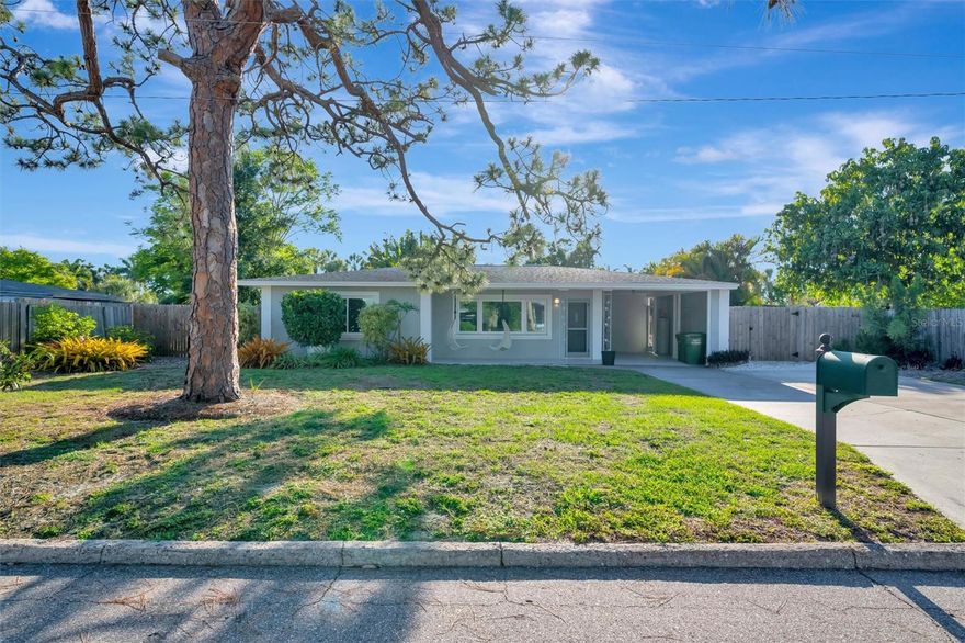 Welcome to this beautifully maintained 3-bedroom, 3-bathroom POOL home located in the highly sought-after Sapphire Shores neighborhood, just west of the trail and steps from the Ringling Museum, Sarasota Bay, and downtown. This bright and spacious residence features timeless terrazzo flooring, expansive new windows that fill the home with natural light, and an updated kitchen complete with granite countertops, stainless steel appliances, and ample cabinet space—perfect for both everyday living and entertaining. The thoughtfully designed layout offers a private primary suite, generous secondary bedrooms, and a versatile bonus space ideal for a home office, den, or flex room. An indoor laundry room adds convenience to your daily routine.

Step outside to your own private oasis—featuring a fully fenced backyard with lush tropical landscaping, a screened-in porch, and a sparkling private pool. Whether you're hosting guests or enjoying a quiet evening at home, this outdoor space is designed for year-round Florida living.