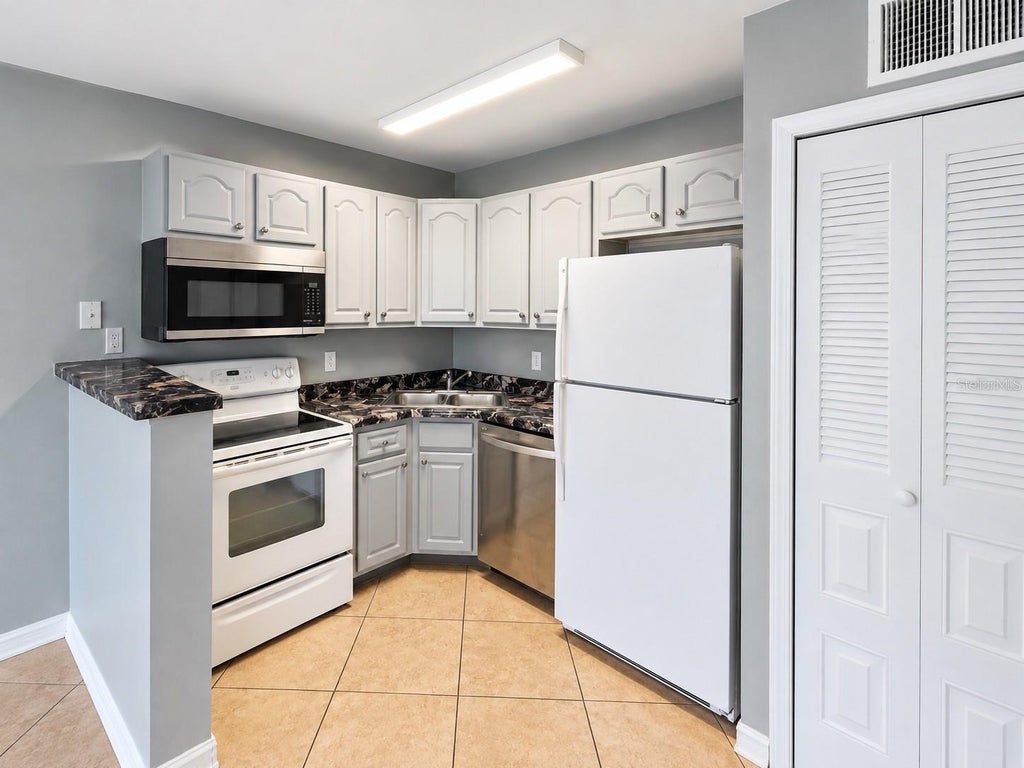 Photo of Orlando, FL 32811 (MLS # O6441852)