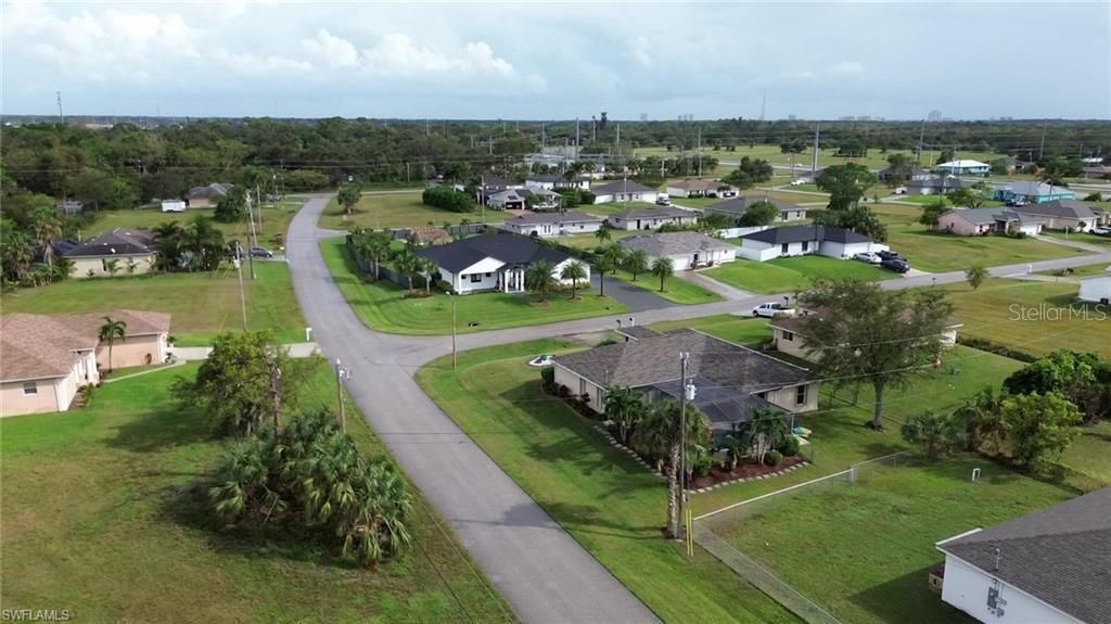 Photo of 2221 NE 25th Terrace, Cape Coral, FL 33909 (MLS # TB8375200)