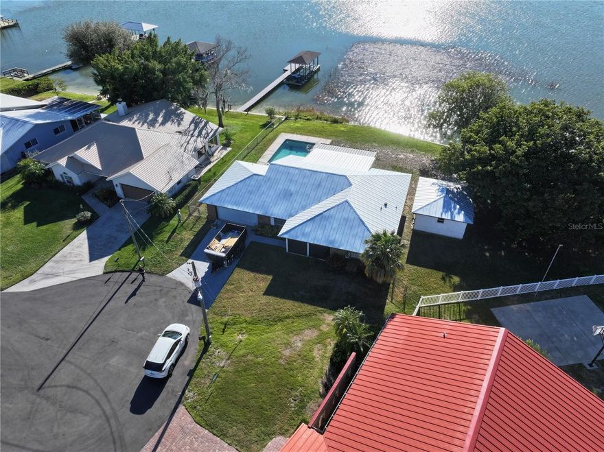 New metal roof completed in January 2026!! Welcome to 194 Mandolin, a gorgeous 3-bedroom, 2-bath lake house retreat in beautiful Lake Placid, FL. With 2,000 sq ft of living space and sitting on a spacious ?-acre lot, this home offers the perfect blend of comfort, relaxation, and Florida charm. Step inside to an open, inviting floor plan filled with natural light and views of the peaceful surroundings. The spacious living areas flow seamlessly, making it ideal for entertaining, family gatherings, or simply unwinding after a long day. Step outside and you'll find your own private paradise - a sparkling inground pool, perfect for cooling off, lounging in the sun, or hosting weekend BBQs. The oversized lot provides room to breathe and enjoy outdoor living year-round. This home has been previously used as an Airbnb, giving buyers the opportunity to continue its successful short-term rental history or simply enjoy it as a full-time residence or personal vacation getaway. Whether you're looking for an investment property, a lake retreat, or a place to call home, 194 Mandolin offers endless potential in the heart of Lake Placid. Don't miss your chance to own a piece of Florida paradise! Professional photos coming soon.