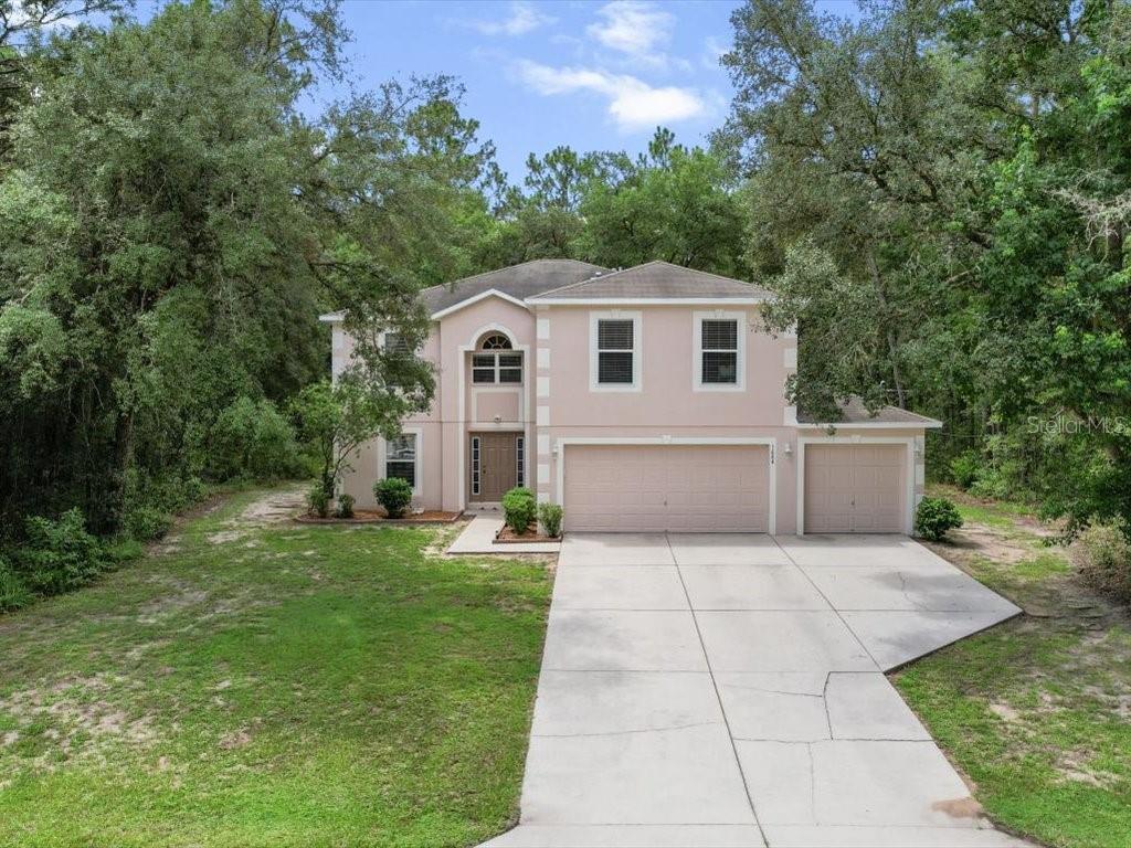 Tucked away with no neighbors on either side or behind, this home offers a rare sense of privacy that complements its spacious design and flexible layout. From the moment you step inside, you’ll appreciate the inviting atmosphere that makes this two-story home ideal for both relaxing and gathering. The lower level of this home offers a well-designed and functional layout. Just off the entryway, you'll find a spacious flex room that can be used for a home office, workout space, guest room, or recreation area. Directly off the flex room is a half bath. The main floor also features a formal dining room, a laundry room tucked away for convenience, and a comfortable living room that flows seamlessly into the kitchen.
The kitchen features a window overlooking the backyard, an island with a second sink, a cozy breakfast nook, and not one but two pantries, offering ample storage for all your kitchen essentials. With thoughtful design and generous space, it’s ideal for both everyday living and entertaining.
Upstairs, you’ll find four bedrooms, including a spacious primary suite, and a bonus loft that serves as a second living area, media room, or playroom, currently used as a TV lounge by the sellers. This open-concept loft offers additional flexibility and room to spread out.
Storage is abundant throughout the home, with generous closets in every room and a large under-stair storage area to help keep things organized. A 3-car garage provides additional storage and parking, and the 10' x 18' screened-in porch offers a relaxing outdoor space to unwind or entertain.
Additional highlights include new exterior paint and siding, a new upstairs HVAC unit, and a front-yard septic system, allowing room for a future backyard pool.
Located in Citrus Springs, a growing community with no HOA, this home offers convenient access to Crystal River, Dunnellon, and Ocala. Enjoy nearby public parks, golf courses, and the 46-mile Withlacoochee State Trail, perfect for biking, walking, and enjoying Florida’s natural beauty. This home delivers space, flexibility, and the lifestyle Citrus Springs is known for.
