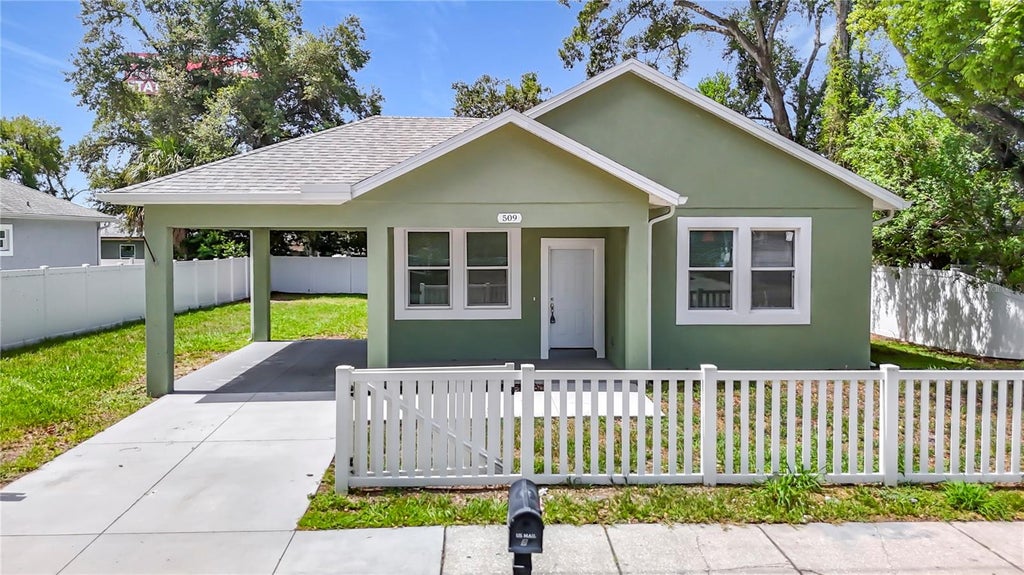 Photo of 509 E Lake Avenue, Tampa, FL 33603 (MLS # TB8531539)
