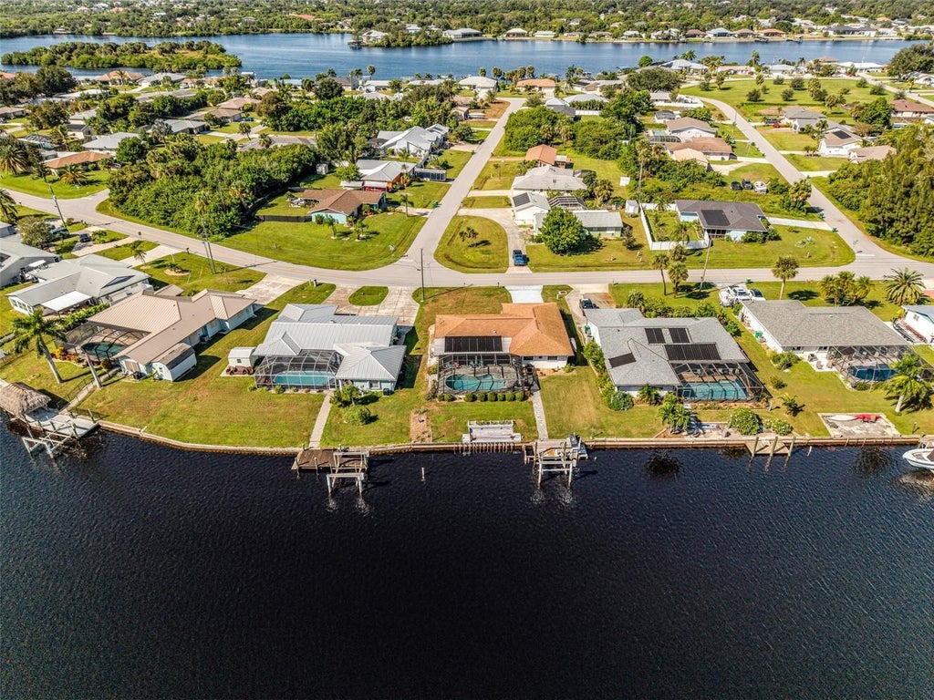 Photo of 311 W Tarpon Boulevard NW, Port Charlotte, FL 33952 (MLS # C7532363)