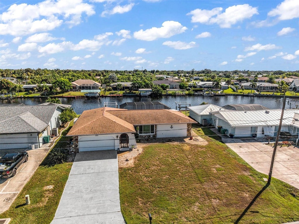 Photo of 311 W Tarpon Boulevard NW, Port Charlotte, FL 33952 (MLS # C7532363)