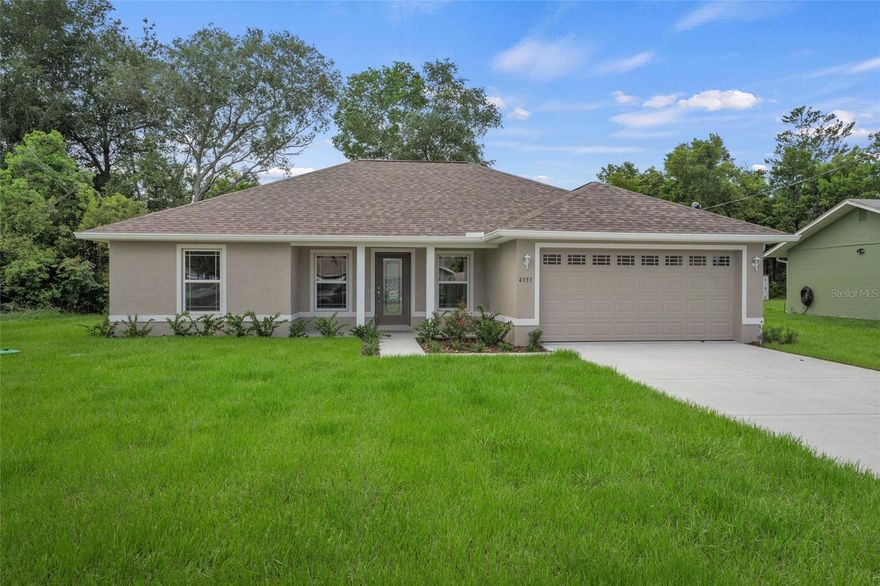 Under Construction. Under Construction. Ready early August. This beautiful 3/2/2 won't last long. Tile throughout the home except in bedrooms and 5 1/4 baseboards. Pictures are a representation, colors may vary.
