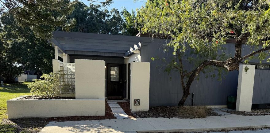 Fantastic end unit with enclosed Florida Room in the sought after Windward Square! This 3/2 features several updates including a, updated kitchen with 42" wood cabinets, granite counters and a center island! Most rooms have upgraded ceiling fans from Dan”s Fans with a lifetime guarantee. This is a wonderful space and great to prep for a dinner party! Open floor concept with dining room and family room. Enclosed Florida room with high impact windows is great extra living space marking this home just over 1700sf. Master bedroom is a good size with walk in closet. Secondary rooms are spacious and full 2nd bath. You have a wonderful front fenced courtyard and a nice sized fenced back yard. End unit and 2 assigned car parking spaces. Community features low HOA and community pool, gated back entrance for easy access to Semoran, tennis courts and club house. Zoned for great Seminole County schools and minutes to shopping/dining, Altamonte Springs Mall, Downtown Winter Park, Full Sail University and to UCF. This is a great one level townhome with very reasonable HOA.