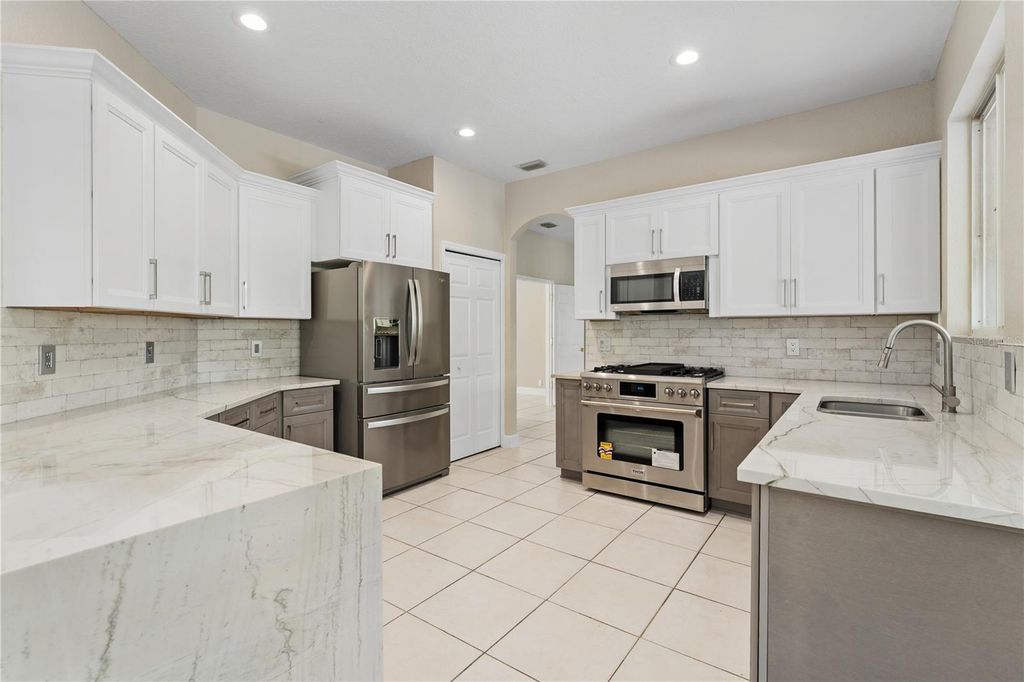 Photo of 10239 Garden Alcove Drive, Tampa, FL 33647 (MLS # TB8469757)