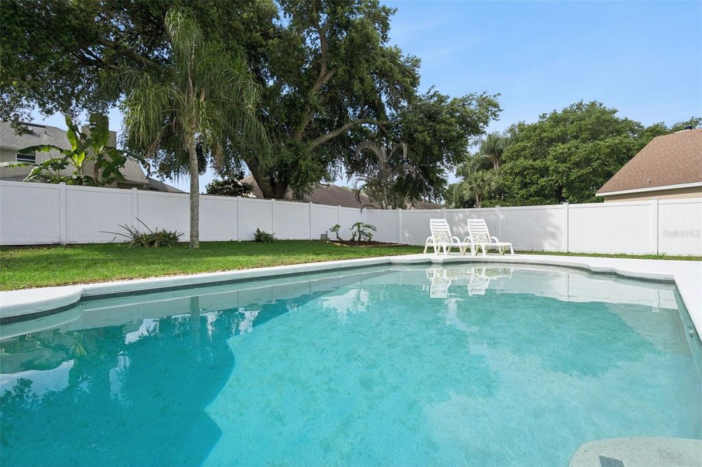 Photo of 12620 Waterhaven Circle, Orlando, FL 32828 (MLS # O6406740)