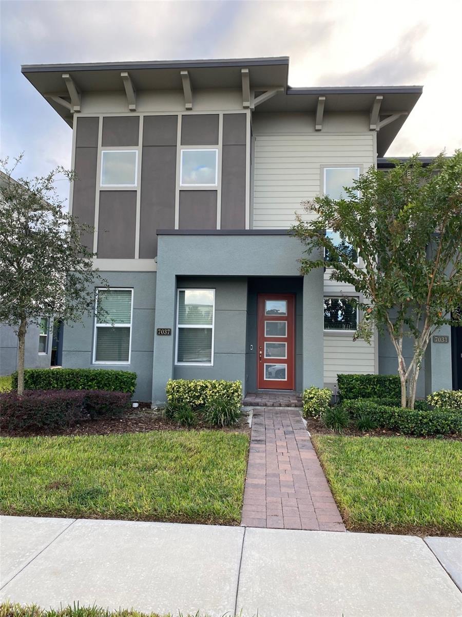 This beautiful 4 bedroom, 3.5 bathroom end unit townhome is located off of Sand Lake Rd in the gated community of Sand Lake Sound. This is the largest townhome in the community and amenities include a play ground, a resort style pool with splash pad, lake access, community dock/kayak rack. This great Dr. Phillips location is convenient to local shopping, restaurants, excellent schools, theme parks, Lockheed Martin Sand Lake location and I-4. This home truly has it all with a spacious open floor plan to include the living and dining area, and an upstairs bonus room with plenty of room, a large kitchen with an island with a breakfast bar, an impressive primary suite with dual sinks, walk-in shower, and a huge closet, three guest bedrooms upstairs, laundry room and a 2 car garage. Available Dec 1, 2025.