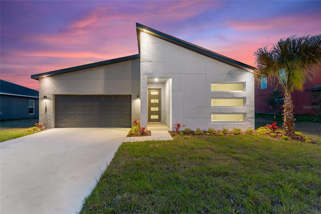 Photo of 149 Golf Aire Boulevard, Haines City, FL 33844 (MLS # O6436230)