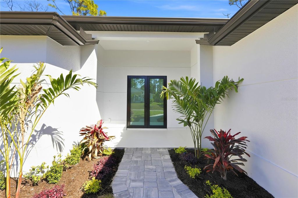 Photo of 2528 Hagerick Lane, North Port, FL 34288 (MLS # A4677638)