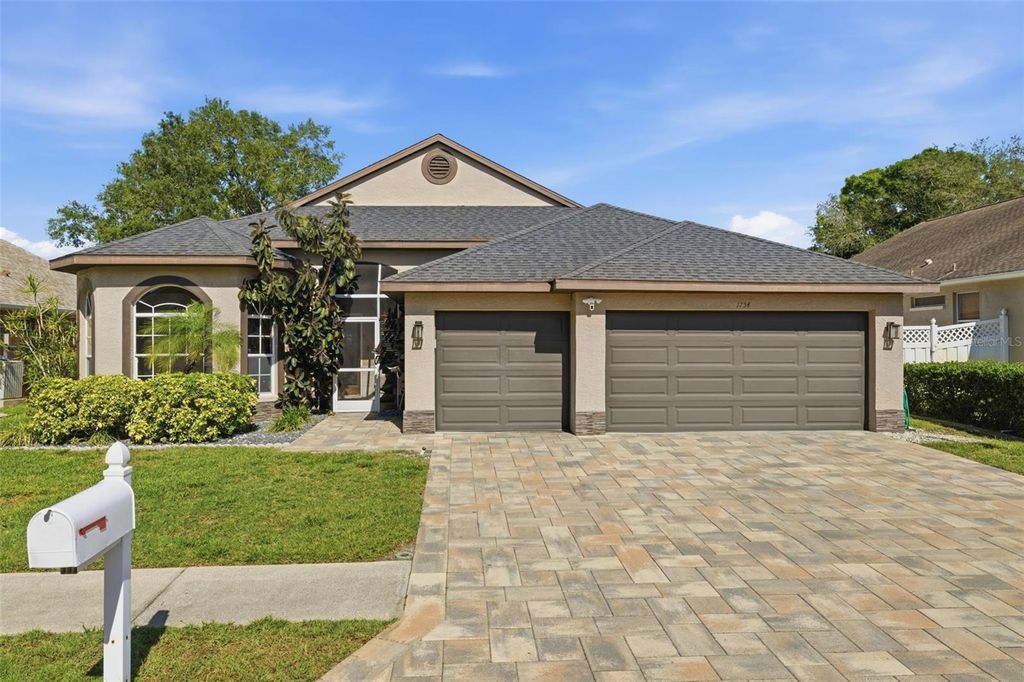 Photo of 1754 Wood Brook Street, Tarpon Springs, FL 34689 (MLS # TB8490711)