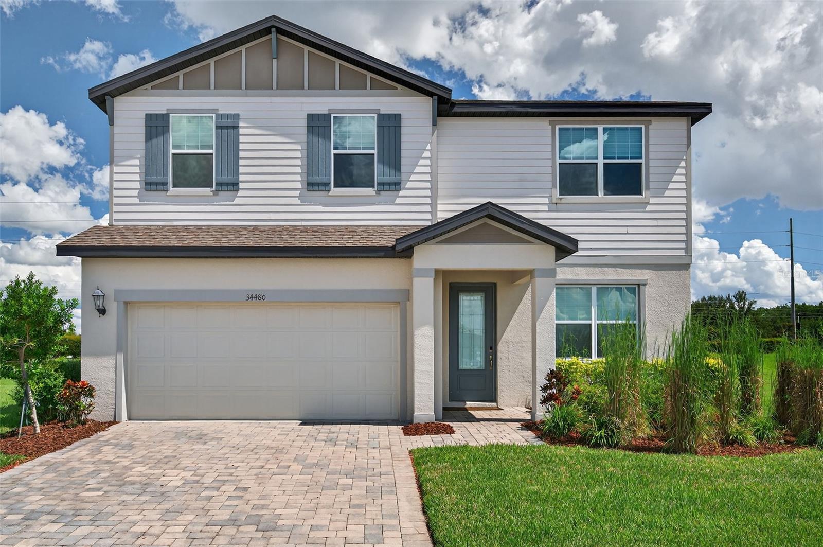 Welcome to 34480 Wynthorne Place, nestled in Wesley Chapel’s highly sought-after master-planned community of Watergrass.
This 2023 Meritage built home in the village of Stonebrook, spans nearly 2,600 heated square feet! This thoughtfully designed residence offers four spacious bedrooms plus a large loft upstairs, providing flexibility for modern living. The home is truly move-in ready, with luxury vinyl plank flooring throughout the downstairs, freshly steamed carpet upstairs, and upgraded finishes at every turn. The chef’s kitchen is this home’s showpiece, featuring timeless white cabinetry, elegant quartz countertops, stainless steel appliances, designer hardware, and stylish light fixtures. The open-concept layout flows seamlessly from the kitchen to the dinette and into the expansive living area, perfect for entertaining or relaxing at home. At the front of the home, a versatile flex room awaits—ideal for a formal dining space, private office, or playroom—the options are endless.
Upstairs, all bedrooms are generously sized, while the bathrooms showcase modern, timeless finishes that balance beauty AND functionality! With its fresh, clean presentation, this home is as practical as it is stunning.
This impeccably maintained home sits gracefully on a premium oversized pie-shaped lot at the end of a quiet cul-de-sac—offering both privacy and plenty of room to create your dream outdoor oasis.
Beyond the home itself, Watergrass is a community that truly enhances your lifestyle. Residents enjoy resort-style amenities, including a clubhouse with catering kitchen and meeting room, a six-lane Olympic pool, a zero-entry pool with splash zone, a state-of-the-art fitness center, tennis and basketball courts, dog parks, trails, and an abundance of parks and green spaces throughout the neighborhood. The location is equally unbeatable—minutes from top-rated schools, hospitals, shopping, dining, and with convenient access to I-75 for an easy commute.
Don’t miss the opportunity to own this exceptional property in one of Wesley Chapel’s most desirable communities—34480 Wynthorne Place is ready to welcome you home.
***ASK ABOUT OUR PREFERRED LENDER INCENTIVES AND ALL OF OUR OTHER PROMOS!***