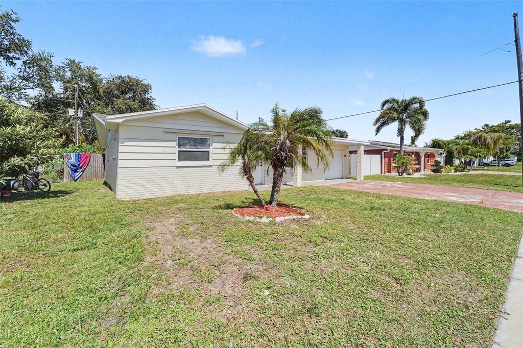 Photo of 4631 Eastwood Lane, Holiday, FL 34690 (MLS # O6446246)