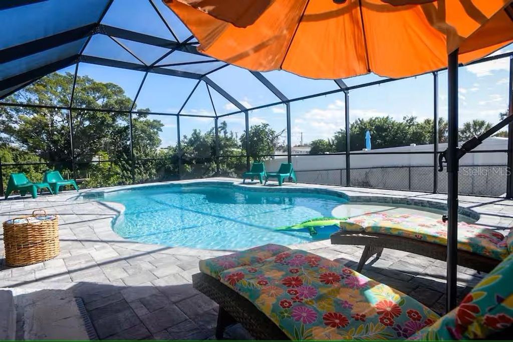 Photo of 831 Palmetto Drive NE, Port Charlotte, FL 33952 (MLS # A4655050)