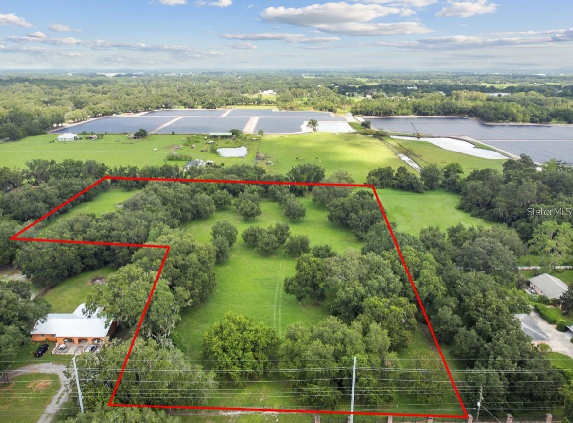 Seize the opportunity to own 6.16 acres of prime real estate in the highly desirable Plant City area, strategically located between Tampa and Orlando. This exceptional parcel is ideal for builders, developers, or investors seeking a versatile site for new home construction.
Zoned AS-1, the property supports the development of 1-acre residential lots and is free from deed restrictions and CDD fees. Situated in Flood Zone X with high and dry elevation, it offers a secure foundation for future development.
Enjoy the tranquility of rural living with the convenience of nearby urban amenities. The property is just minutes from I-4, historic downtown Plant City, local dining, shopping centers, and medical facilities. Additionally, it provides easy access to Tampa International Airport, Gulf Coast beaches, and Central Florida’s renowned theme parks.
Plant City, affectionately known as the “Strawberry Capital of the World,” combines small-town charm with excellent connectivity—making this land an exceptional canvas for your next residential project.
Don’t miss this rare opportunity to bring your vision to life in one of Florida’s most sought-after locations.