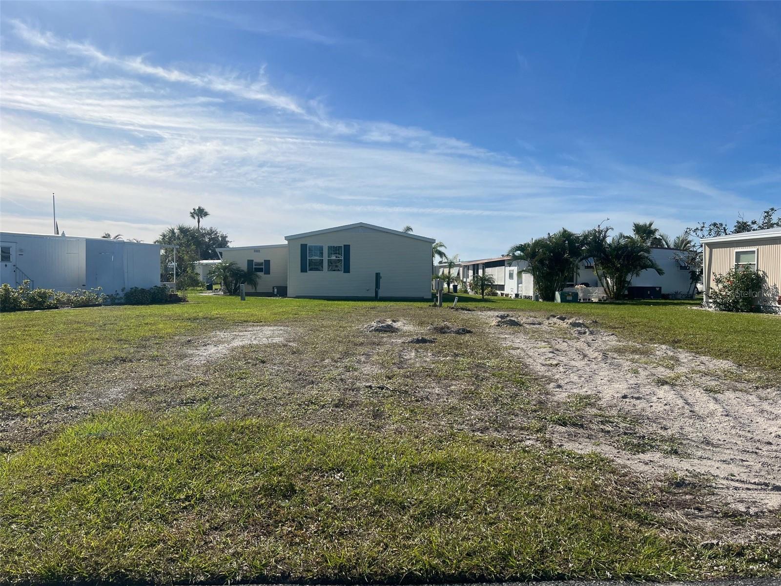 This Lot in Sandalwood Park is just waiting for the home of your dreams whether you are seasonal or full time. Located between Center and Venice Ave makes it very easy to get to the Island or anywhere you choose. The park is a very active 55+ neighborhood with friendly folk and many social gatherings, a pool, shuffleboard, putting green, bocce courts, horseshoes, library and onsite office. Come enjoy all Venice has to offer…..beautiful sandy beaches, golf courses, historic downtown, the legacy trail, parks, wonderful restaurants and shopping. This lot is an opportunity even if you are not quite ready to retire, put it in your portfolio for future development!!