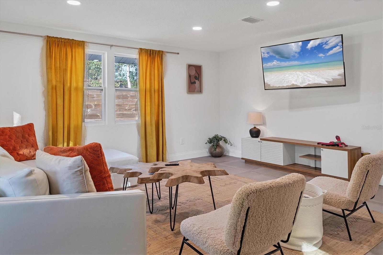 A stylish experience at this fully furnished centrally-located 6 minute drive to downtown home! The Legacy trail is just through the back gate so hop right on your bike or rollerblades. Newly remodeled interior and exterior, including a brand new HEATED POOL (82 degrees). All new furniture. Spacious living room with built in office, separate eat in dining area and large breakfast bar. Upgrades in the large European style kitchen; drink fridge, new stainless steel appliances and quarts countertops. Roku TVs. The living room and dining room are spacious with plenty of seating and a full size eating area/chefs kitchen. The couch converts into a Queen size pull out. Great space for entertaining and family get togethers. The backyard is fully fenced in, super private, large and picturesque with a year round heated pool. Centrally located 1 mile to downtown, 6 miles to Saint Armand’s /Lido Key, 5 miles to famous Siesta Key and 1.8 miles to PineCraft. Conveniently close to all downtown (1 mile) has to offer including tons of restaurants, movie theaters, art, boutique and Marina Jacks pier. Use the bikes to hop on the legacy trail to explore the city or get to Publix (grocery store)in a couple of minutes. Ask about the season and out of season pricing.