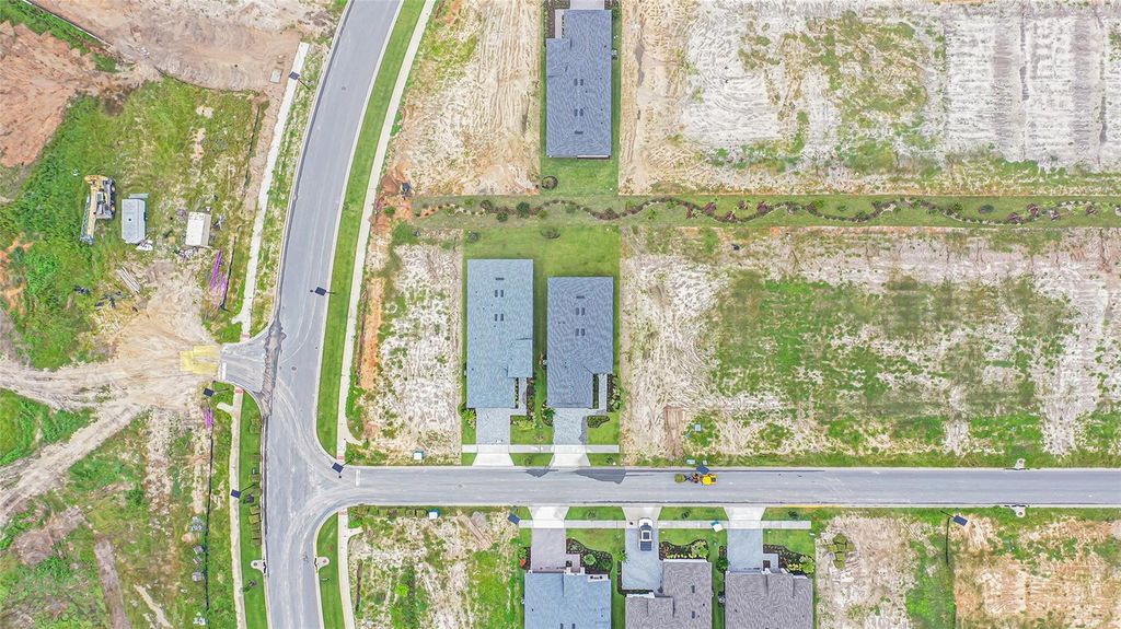 Photo of 570 Hammock Oaks Boulevard, Lady Lake, FL 32159 (MLS # W7880015)
