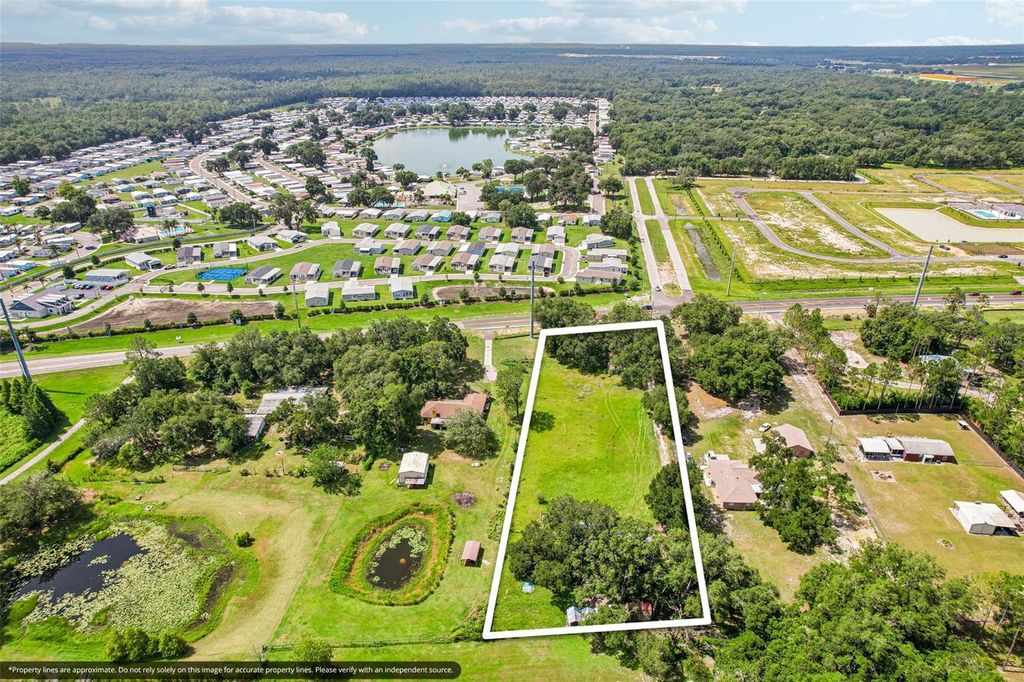 Photo of 40845 County Road 54, Zephyrhills, FL 33540 (MLS # TB8529546)