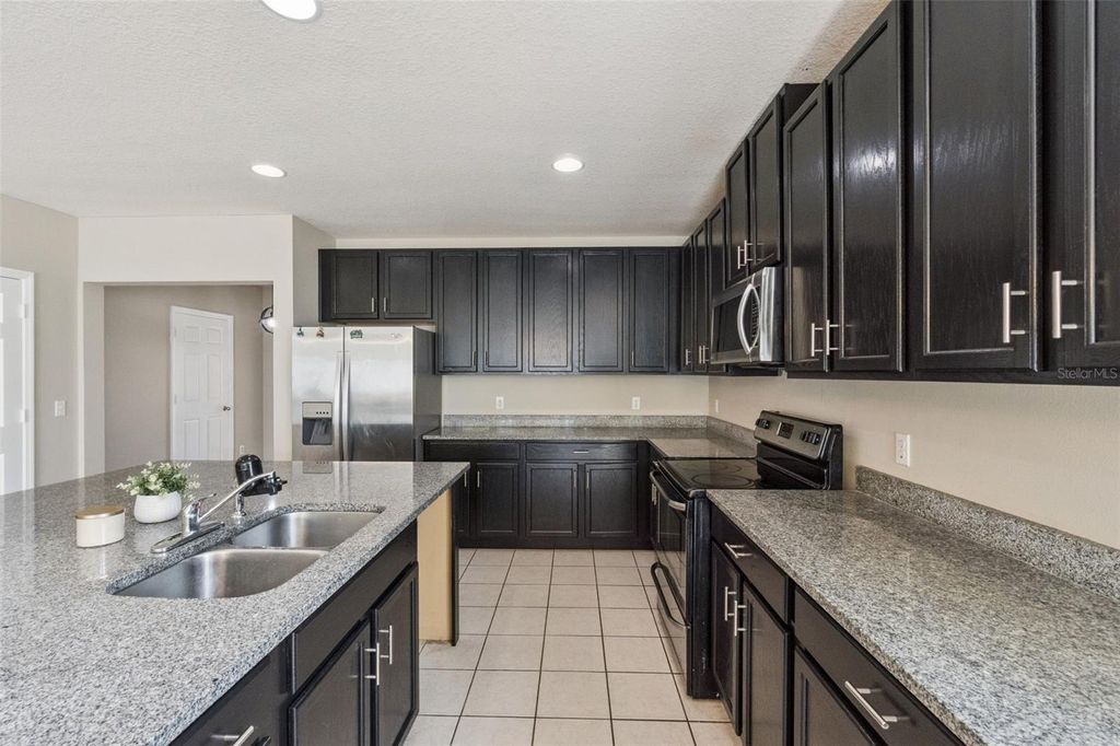 Photo of 3054 Cameron Drive, Kissimmee, FL 34743 (MLS # O6409819)