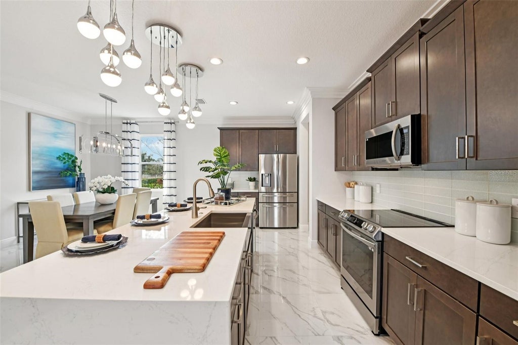Photo of 1217 White Ash Loop, Deland, FL 32720 (MLS # O6450184)
